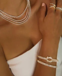 New PAVE GIA BANGLE WITH EMERALD CUT DIAMOND CENTER Bangles